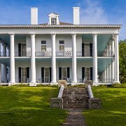 2023-05-12_196770_WTA_R5-2 Dunleith Inn, nestled in Natchez, Mississippi, holds a rich history and architectural allure that transports visitors to a bygone era. Originally constructed in...