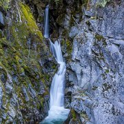 2024-05-09_446330_WTA_R5 2024 Road Trip - Day 38 Christine Falls, situated in Mount Rainier National Park, is a picturesque waterfall known for its stunning beauty and accessibility....