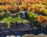 2024-10-16_488870_WTA_Mavic 3 Big Bay Point Lighthouse, located on a rugged bluff overlooking Lake Superior in Michigan’s Upper Peninsula, was constructed in 1896 to address the dangerous...