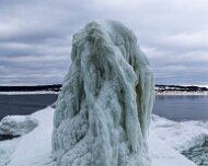 2026-02-01_303975_WTA_Mavic_4_1x The Muskegon South Breakwater Light, standing at the entrance to Muskegon Lake on Lake Michigan, was established in 1872 to guide ships serving one of West...