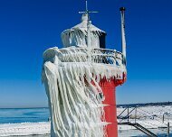 2026-02-01_303578_WTA_Mavic_4_1x The South Haven Lighthouse, marking the entrance to the Black River on Lake Michigan, has guided vessels since 1872, when the first wooden pier lights were...