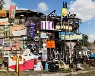 2013-08-13_14-57_29634_WTA_5DM3 Panorama - Original is 14763 x 5202. The Heidelberg Project is an outdoor art project in Detroit, Michigan. It was created in 1986 by artist Tyree Guyton and...